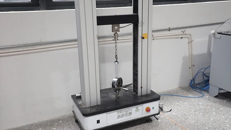 A machine conducting a strength test on a pet accessory, showing the scientific process behind quality control.