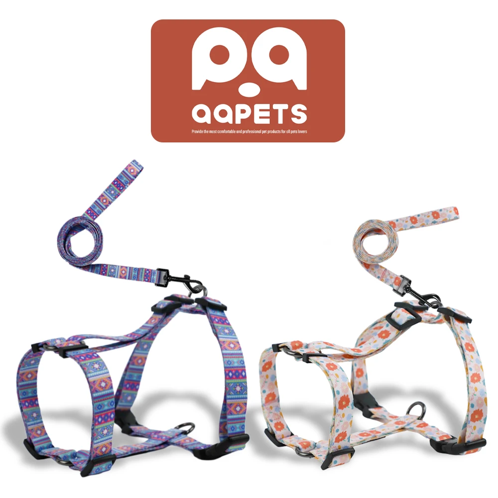 A classic H-style dog harness with multiple adjustment points laid out flat.