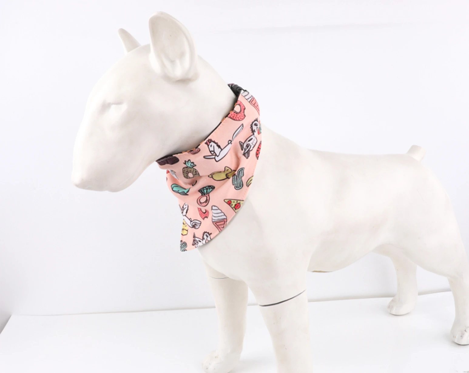 A close-up of a unique custom designer dog collar with brand logo.